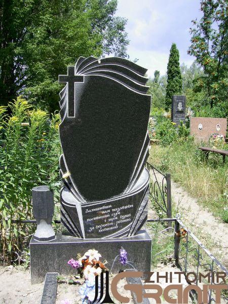 Einzeldenkmal aus Granit - Kreuz und Blütenblätter